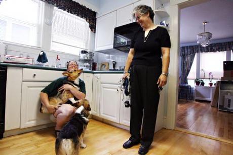 Rabbi Robin Nafshi at home with partner & dogs