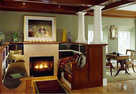 cozy-reading-nook-with-bookcase-and-fireplace