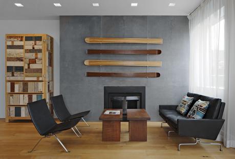 Modern living room with black leather seating