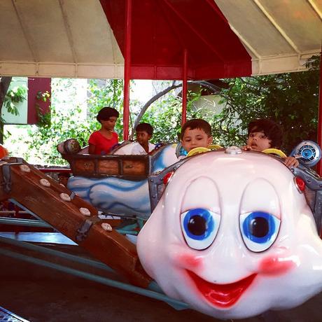 Piglet and friend on the caterpillar ride