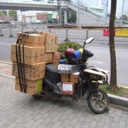The parcel delivery man. Shanghai.