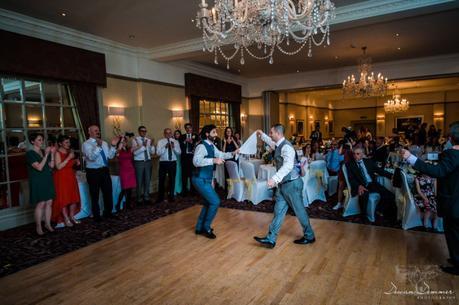 brothers dancing at greek wedding