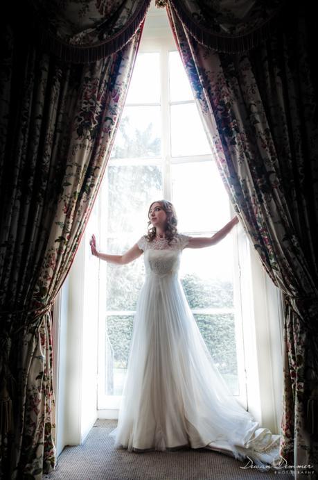 Bride-posed-by-window