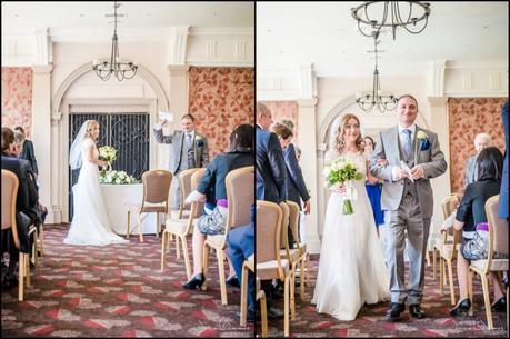 Bride and groom walk together down aisle