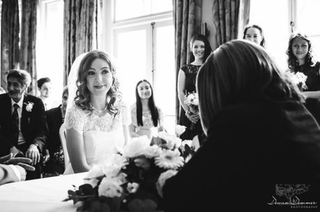 Brides smile at civil ceremony at hendon hall