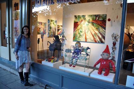 Portland, Oregon Artist Cedar Lee with her oil paintings of trees at Attic Gallery