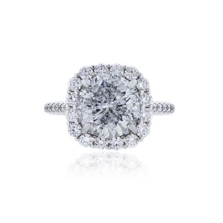 Round diamond in a cushion halo