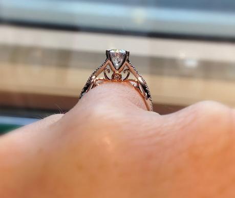 Solitaire engagement ring with rose gold underneath