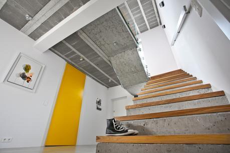Polish house with exposed concrete and stairs