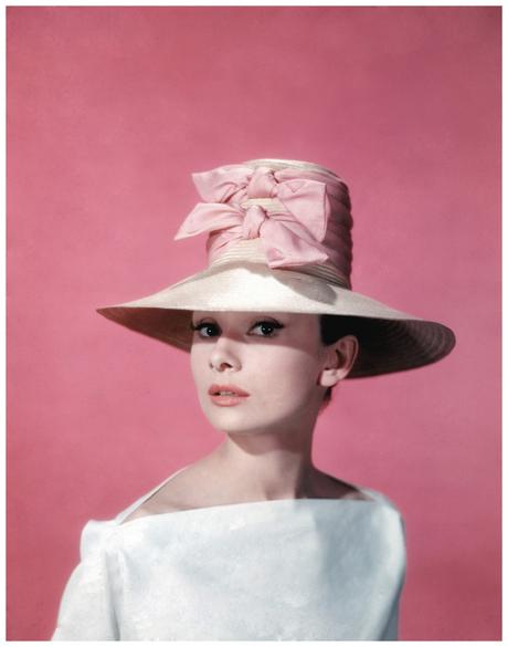 Publicity portrait of Belgian-born American actress Audrey Hepburn (1929 - 1993) as she wears a wide-brimmed hat and white blouse during the filming of the film 'Funny Face' directed by Stanley Donen, 1957. (Photo by Paramount Pictures/Courtesy of Getty Images)