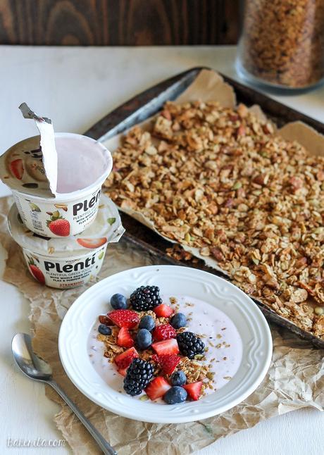 This Almond Coconut Butter Granola is the perfect topping for your morning yogurt, or it's great on it's own as a heathy snack! This easy recipe is gluten-free, refined sugar free, and vegan.