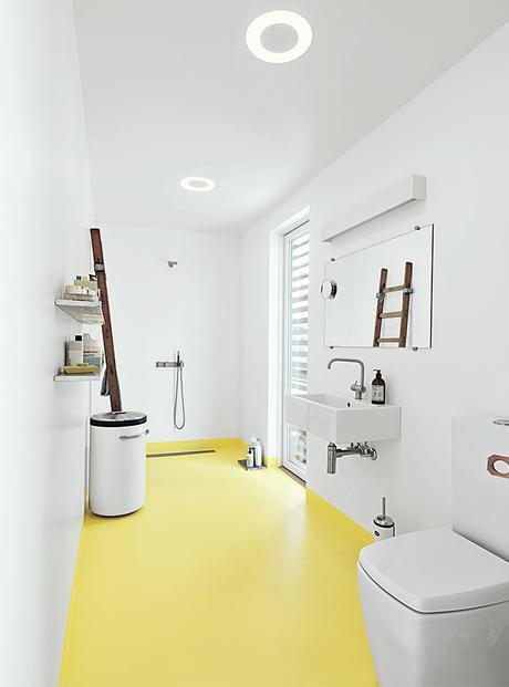 Modern bathroom with yellow floors