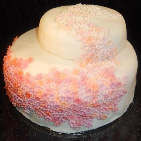 ombre flowers cascade tiered wedding cake white pink orange
