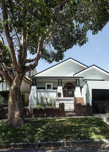 Exterior facade of a traditional bungalow with modern addition