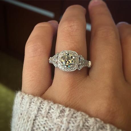 Antique style cushion engagement ring