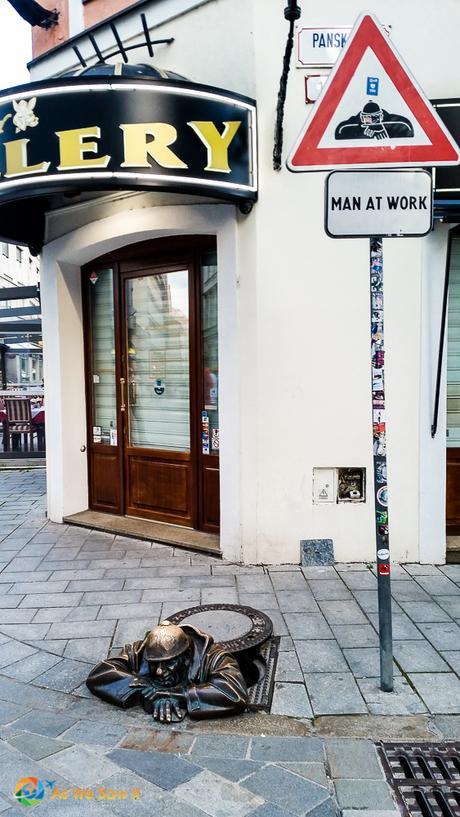 Statue of man in manhole in Bratislava