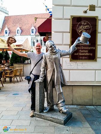 Tipping a hat to a Bratislava statue