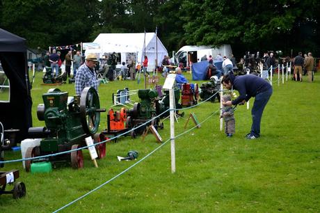 child and dad with tractor engines at Tractor Fest Newby Hall 