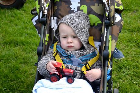 grumpy child with a tractor at Tractor Fest Newby Hall 