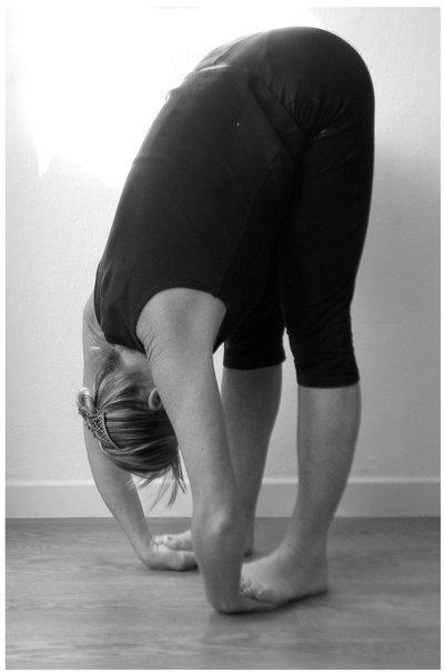 Padahastasana or Standing Forward Bend