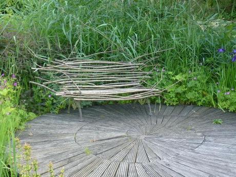 rustic garden bench made of sticks