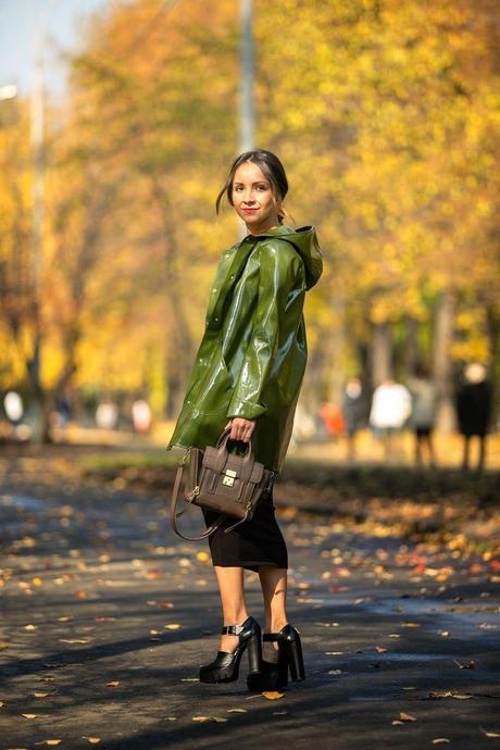 The girl in green Raincoat