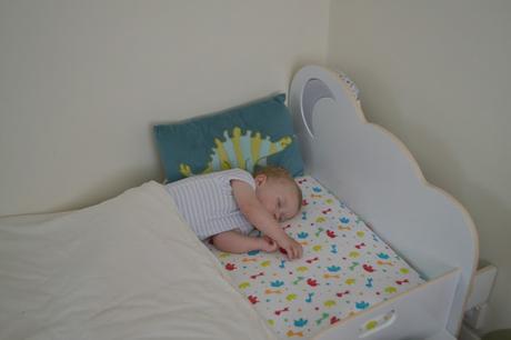 HelloHome StarBright toddler bed with sleeping child