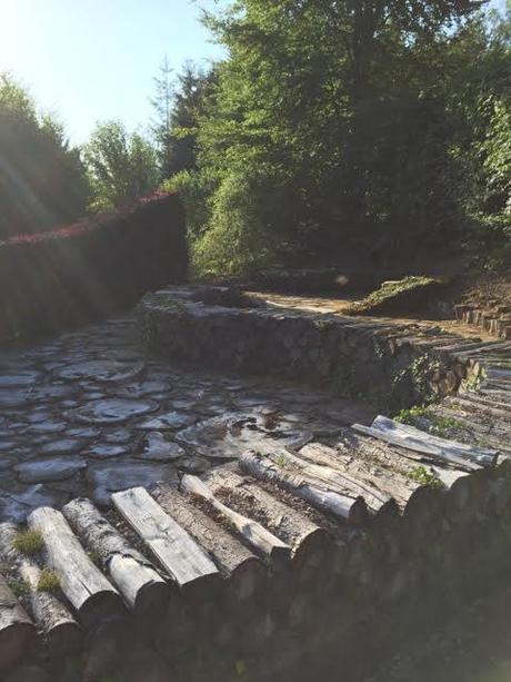 curving wall made from logs