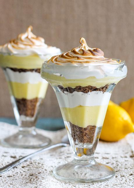 These Lemon Meringue Pie Parfaits are a no-bake dessert that will be your new summer favorite! Lemon curd, graham cracker crumbs, and meringue makes the best individual treats.