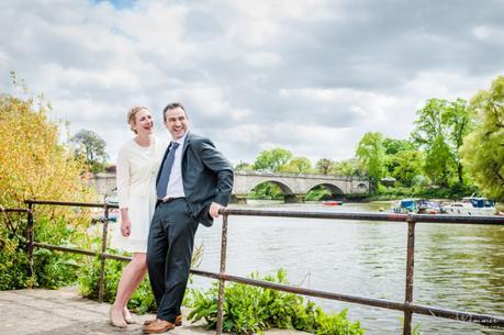 Wedding couple look out on the river richmond on thames
