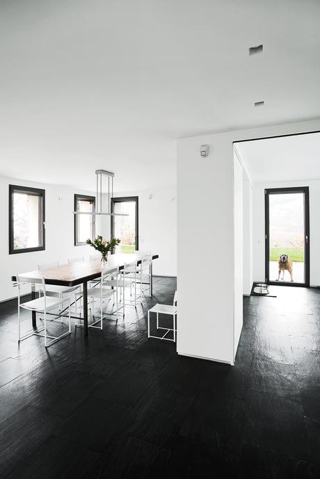Black and white minimalist dining area renovation