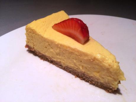 slice of gluten free low fat baked mango cheesecake with recipe and how to