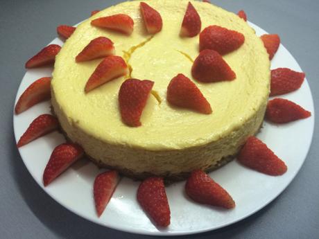 gluten free mango cheesecake served with fresh british strawberry slices recipe and method