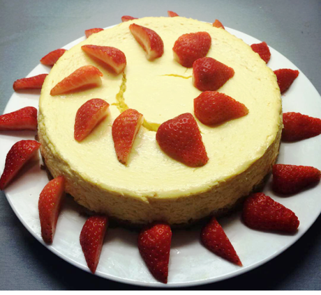 baked mango cheesecake served with fresh strawberries recipe and method easy gluten free dessert