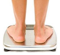 weighing yourself on the bathroom scales