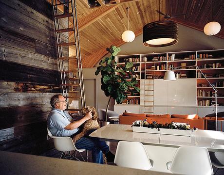 Modern universal design home in Baltimore with reclaimed wood, BoConcept table, Graypants pendant and Eames fiberglass chairs in the dining room