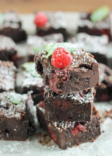 These Raspberry Mint Brownies use tangy raspberries and fresh mint for an addictively fresh and minty taste in these rich and fudgy chocolate brownies. 