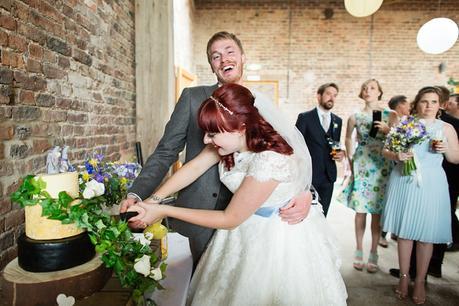 Barmbyfield Barn Wedding Photography Cake cutting