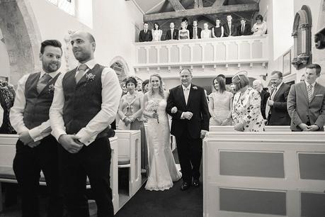 Bride and father walking down the aisle