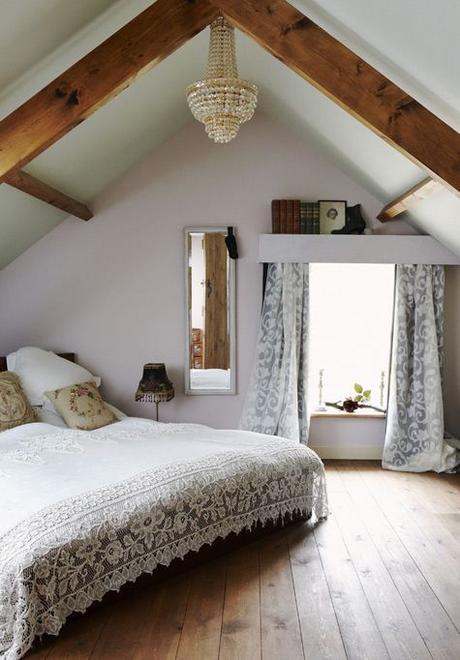 shabby chic attic space with wooden beam