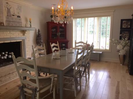 The room today. We still have work to do in the dining room (recraft the fireplace and add built-in cabinets), but the table has changed the feel of the room entirely. It's much more calming with the gray tones, and the table came out so well. Don't be afraid to give new life to an older piece.