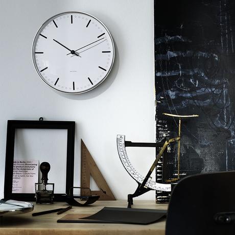 Classic wall clock with sleek frame and hands