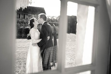 Bride & Groom candid kiss