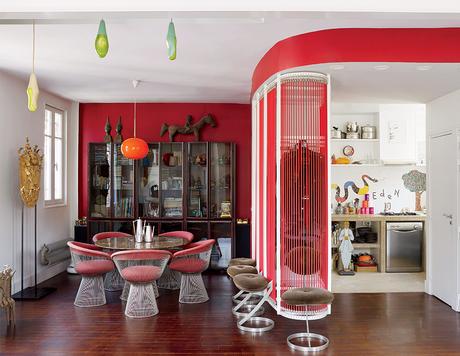 Colorful dining room and kitchen in Nicolas Roche's Paris apartment