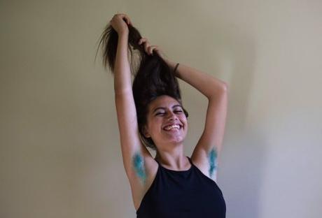 Destiny Moreno shows off her blue armpit hair (photo by Ruth Fremson, NYT)