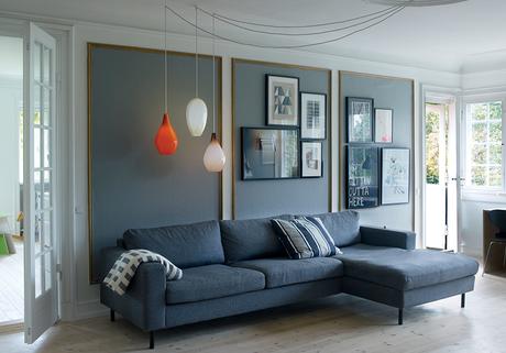 Copenhagen renovation living room with vintage glass pendant lights.