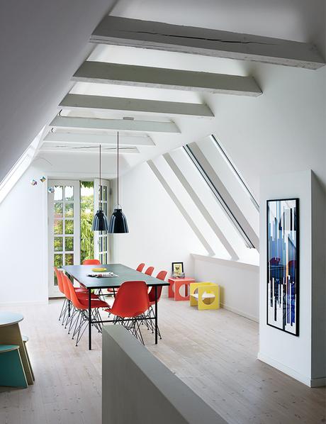 Copenhagen renovation attic with Eames chairs.