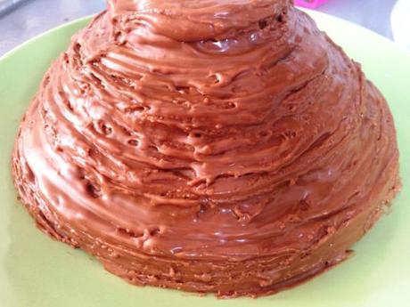 sticky chocolate honey buttercream icing on beehive cake