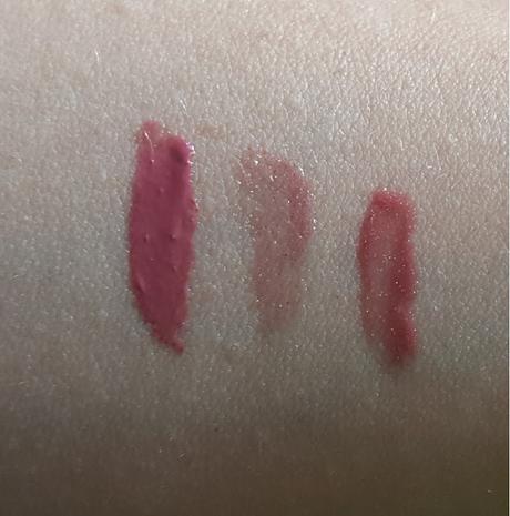 Left to right: NYX Butter Gloss Angel Food Cake, Burt's Bees Lip Gloss Nearly Dusk, Lancome Gloss in Love 351