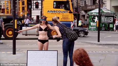 Jae West took to Piccadilly Circus wearing nothing put her underwear to promote self-acceptance 